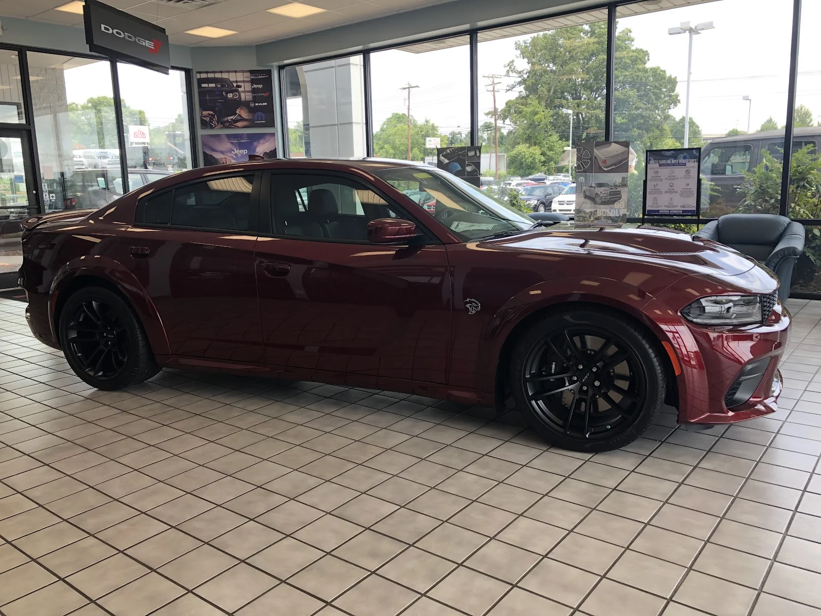 Inside Shades of Grey Window Tinting — shop interior and work bay